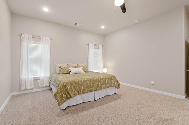 bedroom with carpet, visible vents, baseboards, and recessed lighting