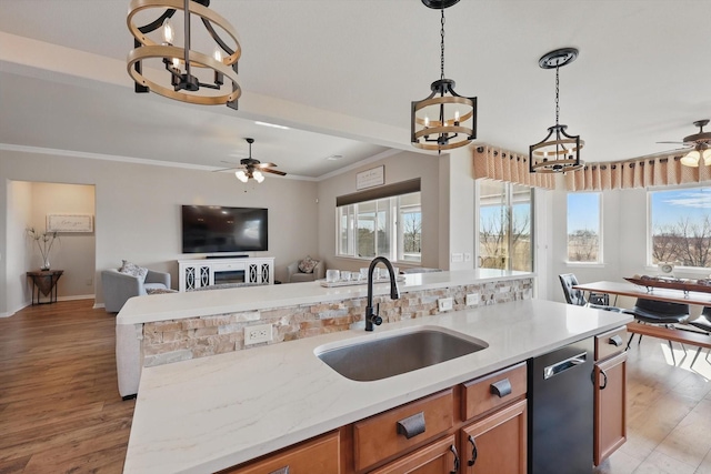 10112 Parkcrest Ct, Denton, TX 76207 - kitchen with open floor plan, plenty of natural light, a sink, and ceiling fan with notable chandelier