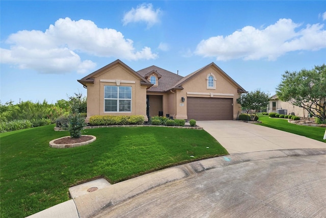 10112 Parkcrest Ct, Denton, TX 76207 - view of front of house with an attached garage, driveway, a front yard, and stucco siding