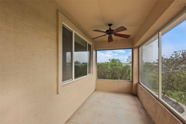 10112 Parkcrest Ct, Denton, TX 76207 - unfurnished sunroom featuring ceiling fan and concrete floors