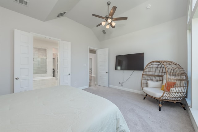 carpeted bedroom featuring baseboards, visible vents, vaulted ceiling, and connected bathroom