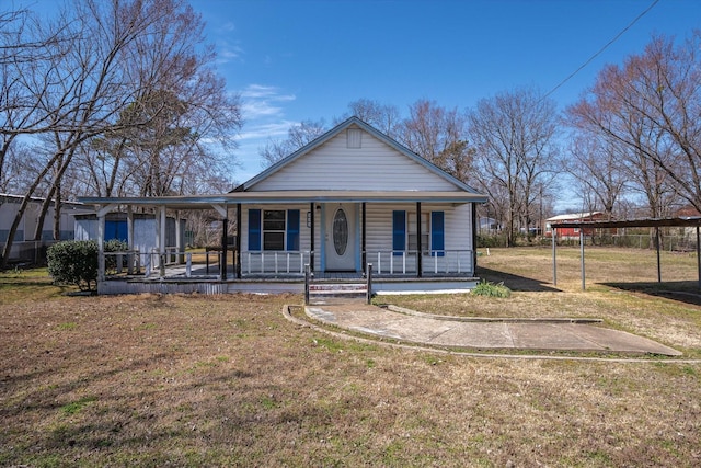 view of front of home with a porch and a front lawn