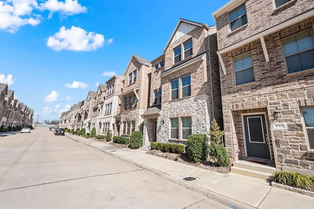 view of building exterior with a residential view