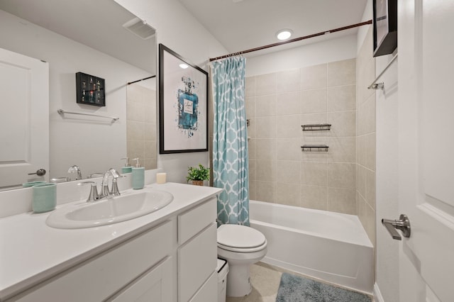 bathroom with toilet, vanity, shower / bath combo with shower curtain, and visible vents