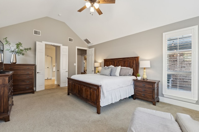 bedroom featuring visible vents and light carpet