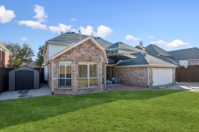 view of front of house featuring brick siding, a storage unit, an attached garage, fence, and a front lawn