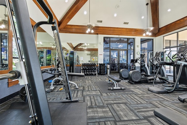 gym with high vaulted ceiling, carpet, and visible vents