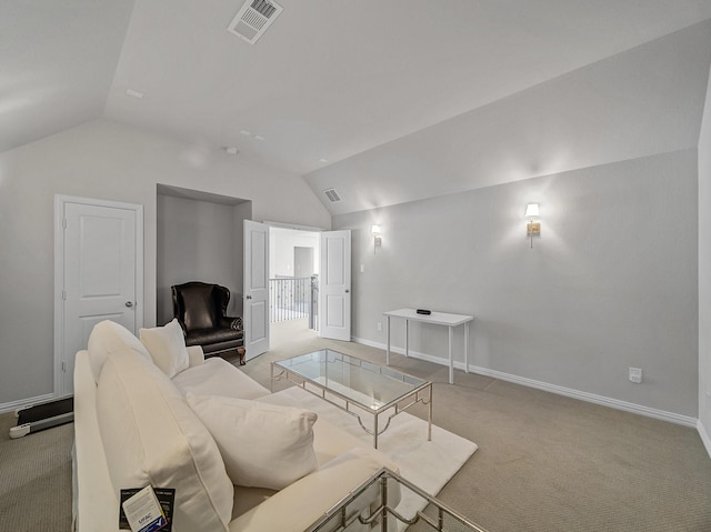 living room featuring visible vents, vaulted ceiling, light carpet, and baseboards