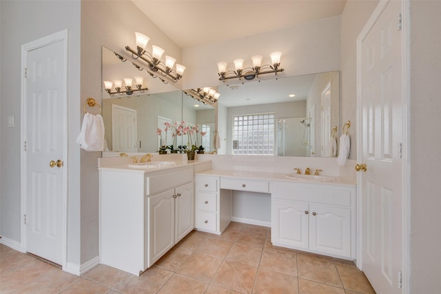 3409 Windridge Dr, Garland, TX 75043 - full bath featuring tile patterned flooring, a shower stall, vanity, and a chandelier