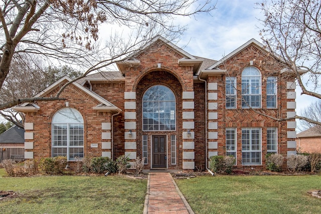 3409 Windridge Dr, Garland, TX 75043 - view of front of home featuring brick siding and a front yard