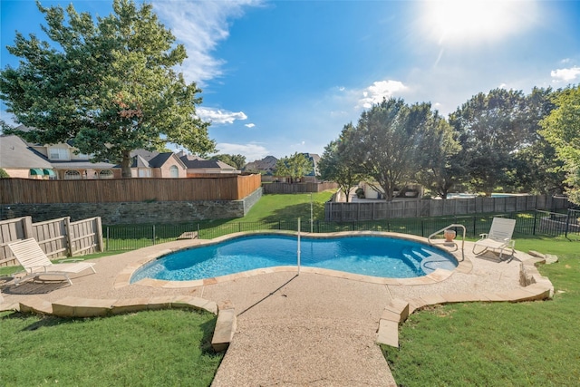 view of pool with a fenced backyard, a fenced in pool, a lawn, and a patio