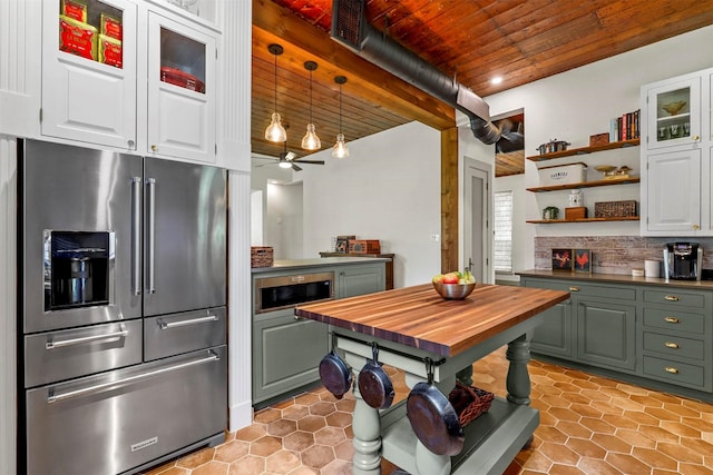 115 N 1st St, Midlothian, TX 76065 - kitchen featuring high end refrigerator, wooden ceiling, butcher block countertops, open shelves, and green cabinetry
