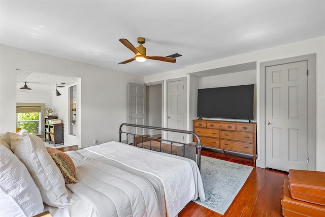 115 N 1st St, Midlothian, TX 76065 - bedroom featuring dark wood-style floors and ceiling fan