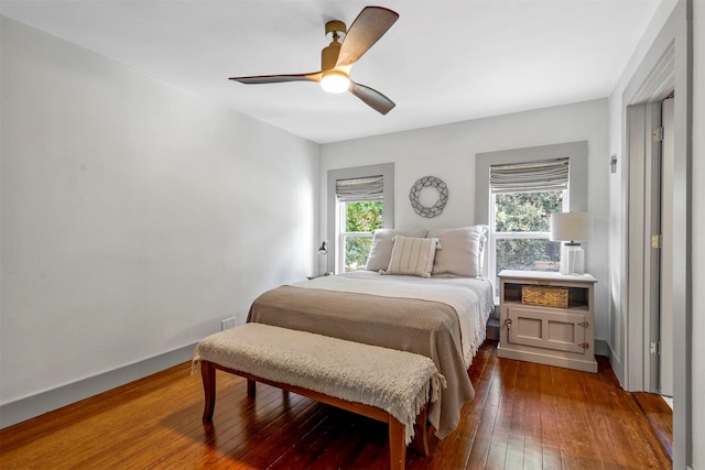 115 N 1st St, Midlothian, TX 76065 - bedroom featuring dark wood-type flooring and ceiling fan