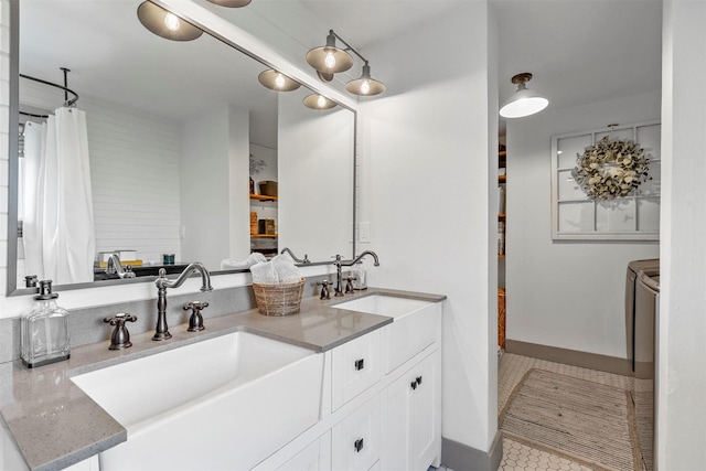 115 N 1st St, Midlothian, TX 76065 - full bathroom with washer and clothes dryer, double vanity, and tile patterned flooring