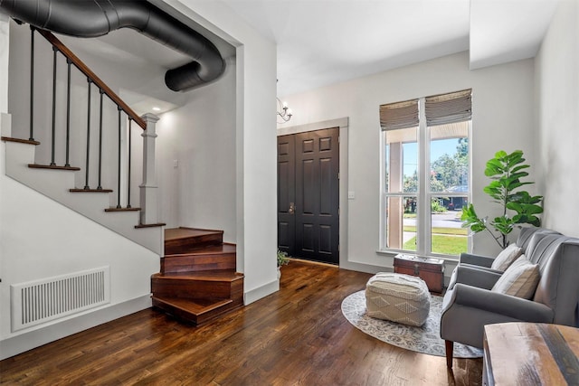 115 N 1st St, Midlothian, TX 76065 - foyer entrance featuring wood finished floors, stairs, and a chandelier