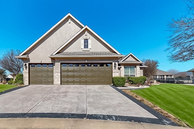 view of front of house featuring a garage, stone siding, driveway, stucco siding, and a front lawn