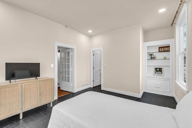 bedroom featuring recessed lighting, visible vents, dark wood finished floors, and baseboards