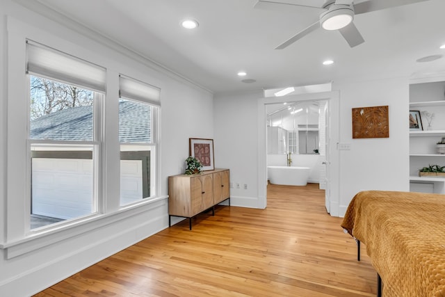 bedroom featuring light wood-style floors, baseboards, and recessed lighting