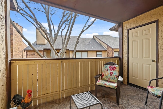 view of patio / terrace with a balcony