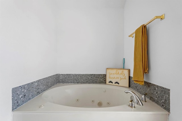 full bath featuring a jetted tub