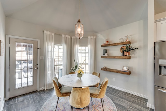 425 Brook Meadow Dr, Midlothian, TX 76065 - dining room featuring healthy amount of natural light, lofted ceiling, and baseboards