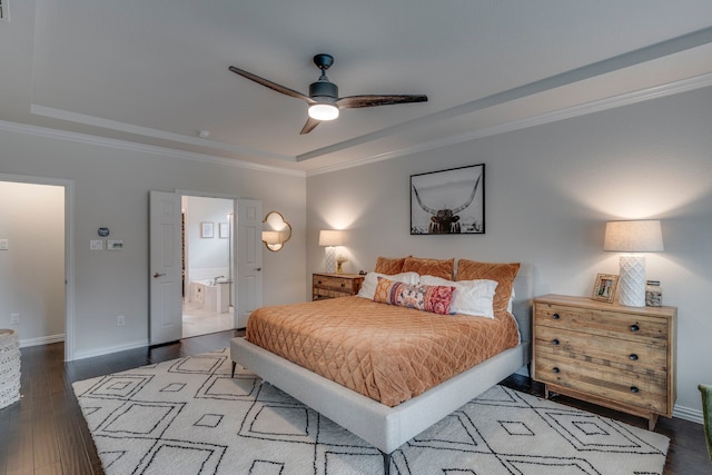 425 Brook Meadow Dr, Midlothian, TX 76065 - bedroom with a tray ceiling, wood finished floors, ornamental molding, ensuite bathroom, and baseboards
