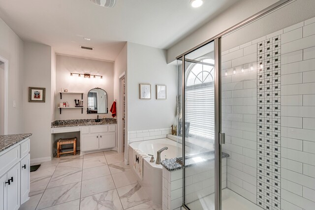 425 Brook Meadow Dr, Midlothian, TX 76065 - full bathroom featuring a stall shower, vanity, marble look tiles, and a garden tub