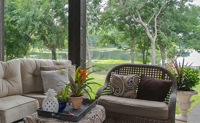 sunroom with a water view