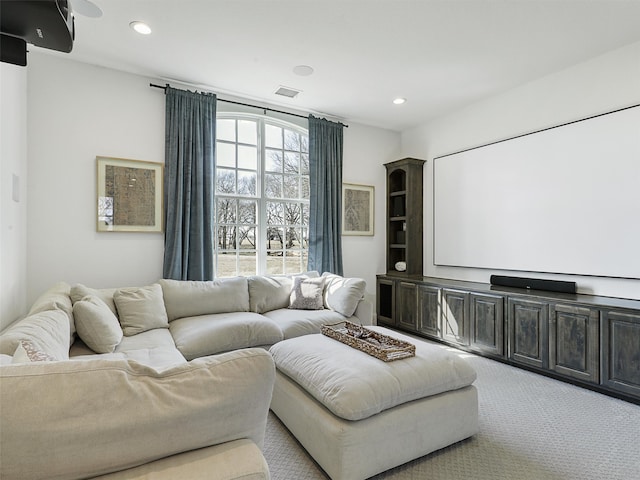 cinema room with carpet, visible vents, and recessed lighting