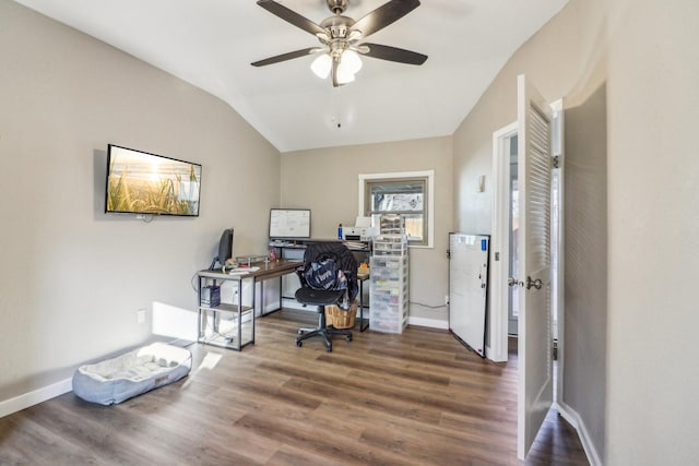 home office with lofted ceiling, ceiling fan, baseboards, and wood finished floors