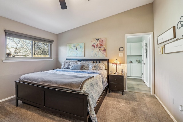 bedroom with vaulted ceiling, carpet, a ceiling fan, and baseboards