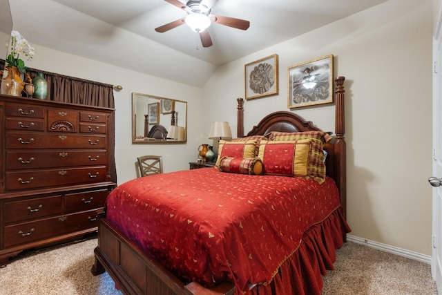 carpeted bedroom featuring lofted ceiling, ceiling fan, and baseboards