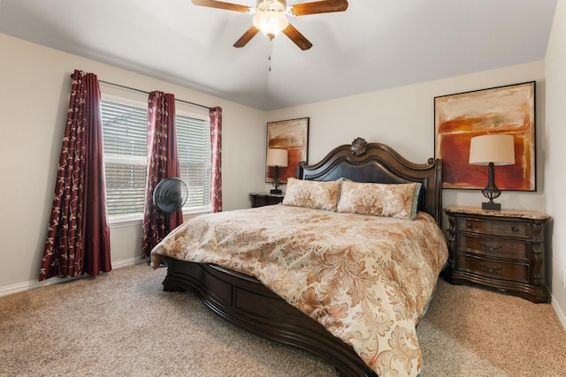 bedroom with carpet, baseboards, and a ceiling fan