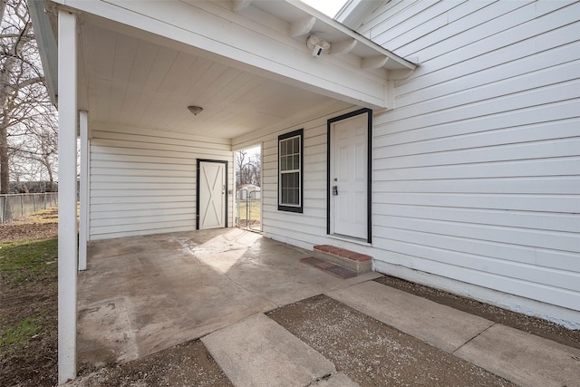 view of patio featuring fence