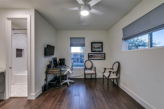 home office featuring a ceiling fan, baseboards, visible vents, and dark wood-style flooring