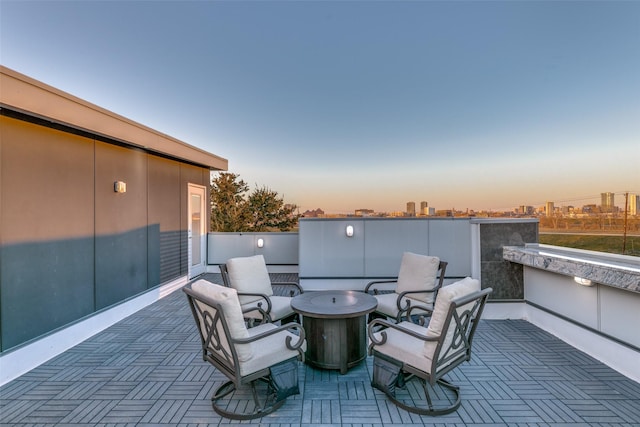 view of patio / terrace featuring a city view