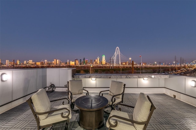 view of patio / terrace featuring a city view and a balcony