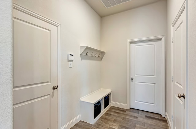 2101 Bishop Barrel Ln, Wylie, TX 75098 - mudroom featuring wood finished floors and baseboards