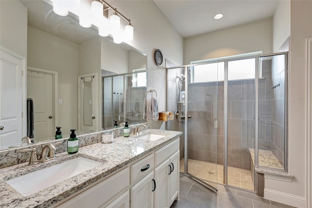2101 Bishop Barrel Ln, Wylie, TX 75098 - full bathroom with double vanity, a stall shower, and tile patterned flooring
