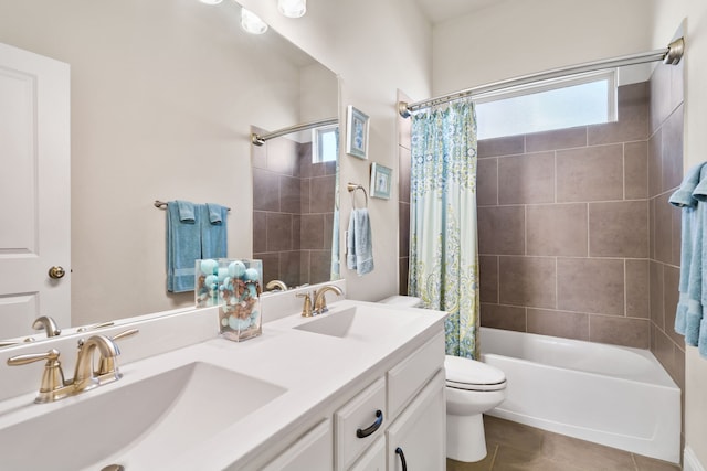 bathroom with shower / bath combo, a sink, toilet, and tile patterned floors