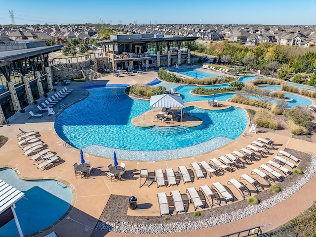 2101 Bishop Barrel Ln, Wylie, TX 75098 - community pool featuring a residential view, a hot tub, and a patio area