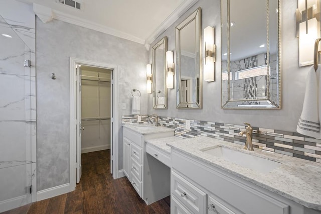 full bath with wood finished floors, visible vents, a shower, ornamental molding, and tasteful backsplash