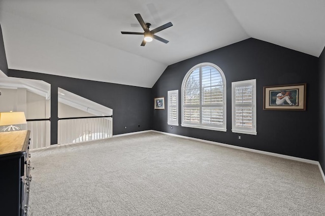 bonus room featuring carpet, ceiling fan, baseboards, and vaulted ceiling