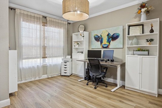 home office featuring ornamental molding, light wood-type flooring, and baseboards