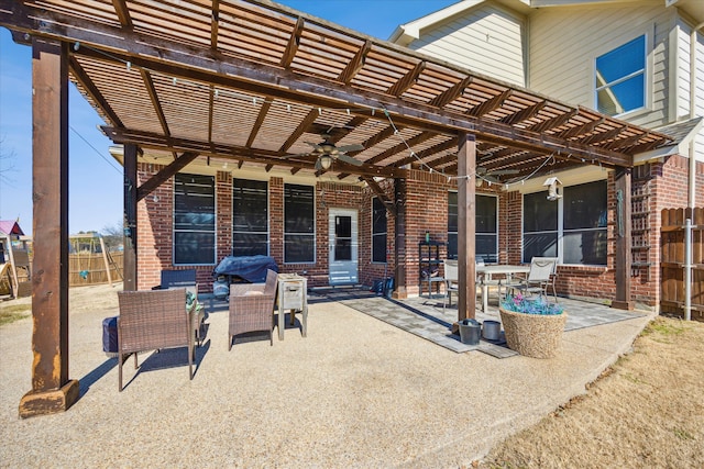 view of patio with fence and a pergola