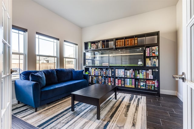 interior space featuring wood finish floors and baseboards