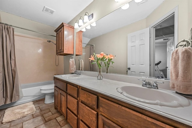 bathroom with shower / tub combo, visible vents, a sink, and toilet