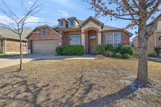 view of front of house featuring concrete driveway, brick siding, roof with shingles, and an attached garage