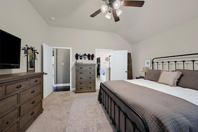 bedroom featuring ceiling fan, baseboards, vaulted ceiling, and light colored carpet